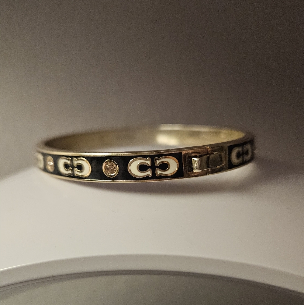 Coach Gold-Tone Bangle with Black Enamel & Logo Motif